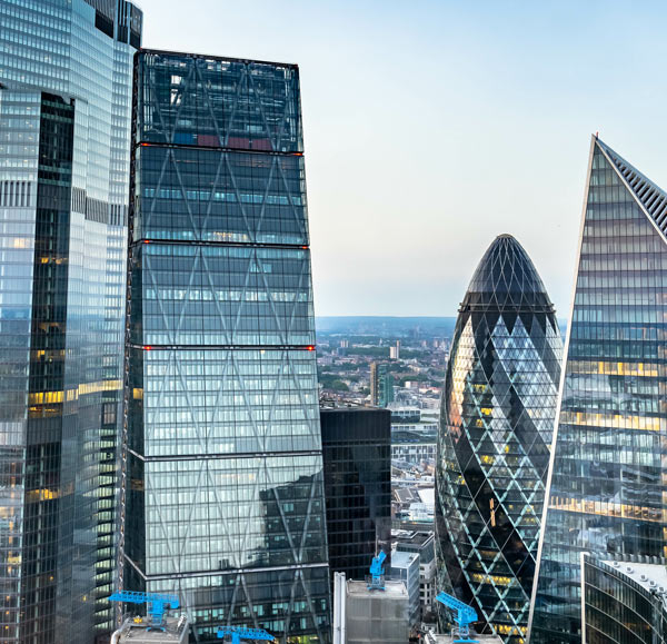 modern skyscrapers showcasing unique architectural designs in a city skyline